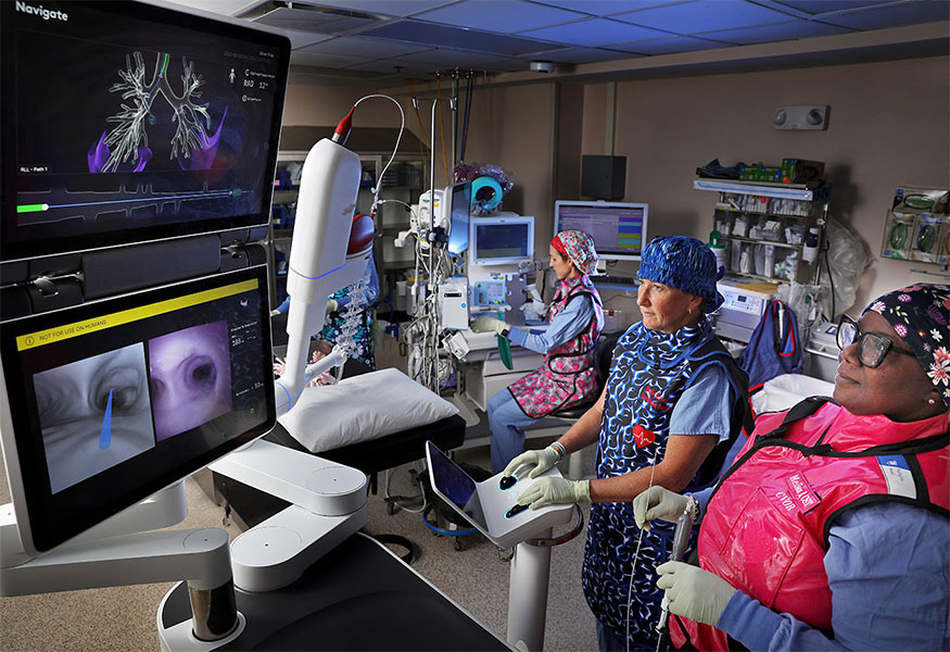 Lab technicians evaluating a patient's heart valves.