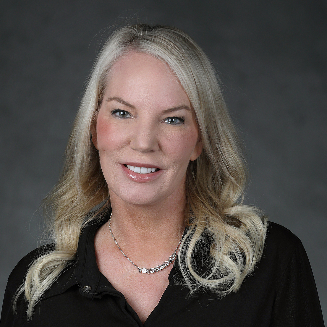 Heashot of Leslie K. West